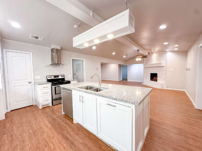 Building Photo - Spacious Living & Modern Upgrades