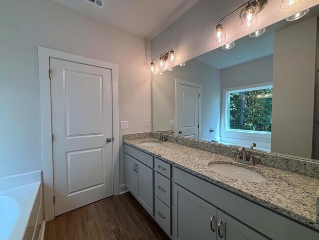 Building Photo - 4421 Whitetail Path Cove