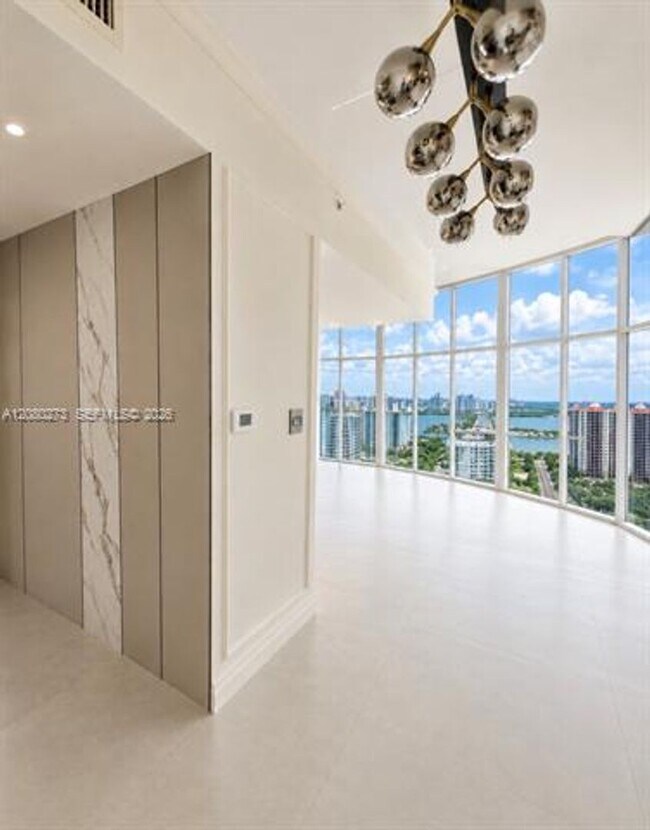 Building Photo - 16699 Collins Ave