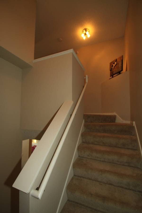 Stairs from main floor to upper - 3843 Abercrombie Ln
