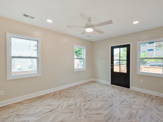Living Room with Front Door View - 1405 Holt St