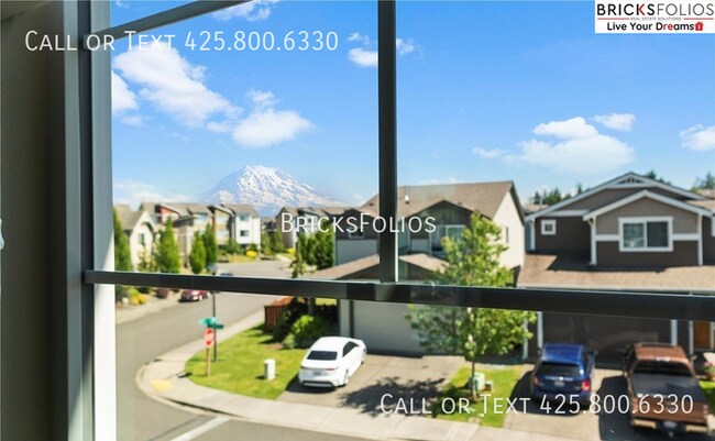 Building Photo - Elevate Your Lifestyle in the Heart of Puy...