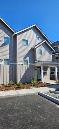 Building Photo - Brand New Three-Bedroom Townhomes, 1/2 a m...