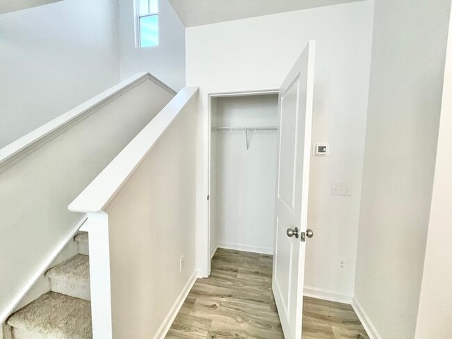 Building Photo - Three bedroom 2 1/2 bath paired home. Clos...