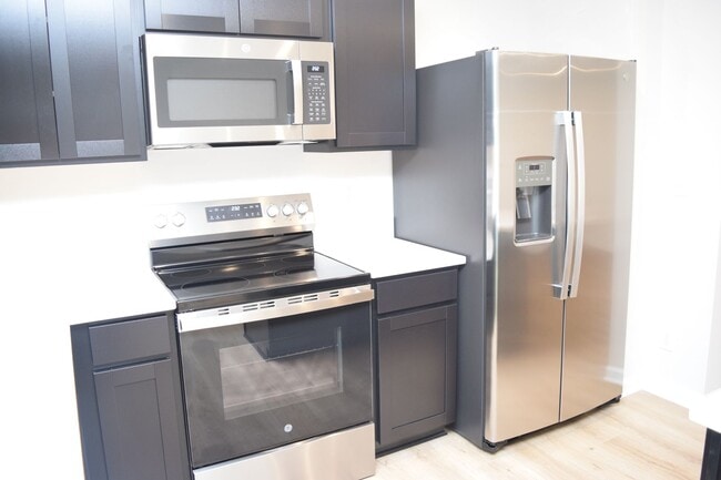 Building Photo - Modern 3-Bedroom Townhouse with Garage & Private Patio