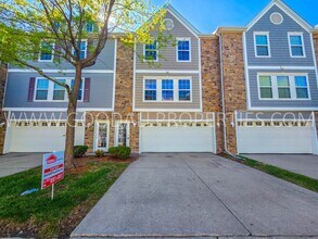 Building Photo - Bright & Spacious Waukee Townhome Near Dining, Shopping & Entertainment and attached 2-car garage
