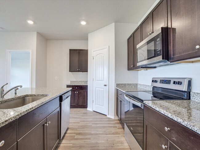 Building Photo - NEW LUXURY VINYL FLOORING IN ALL ROOMS - 3...