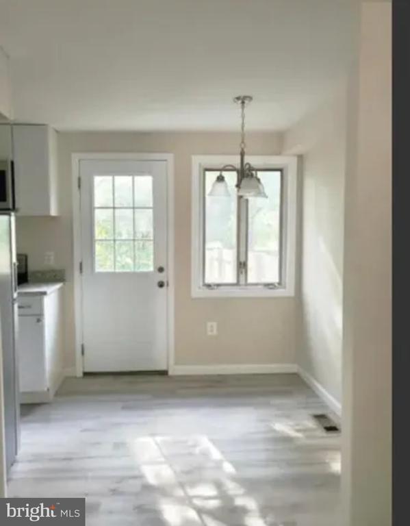 Building Photo - 9025 Merrimack Dr