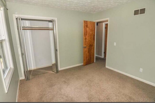 Building Photo - Beautiful 4-Bedroom Home on Spacious Corne...