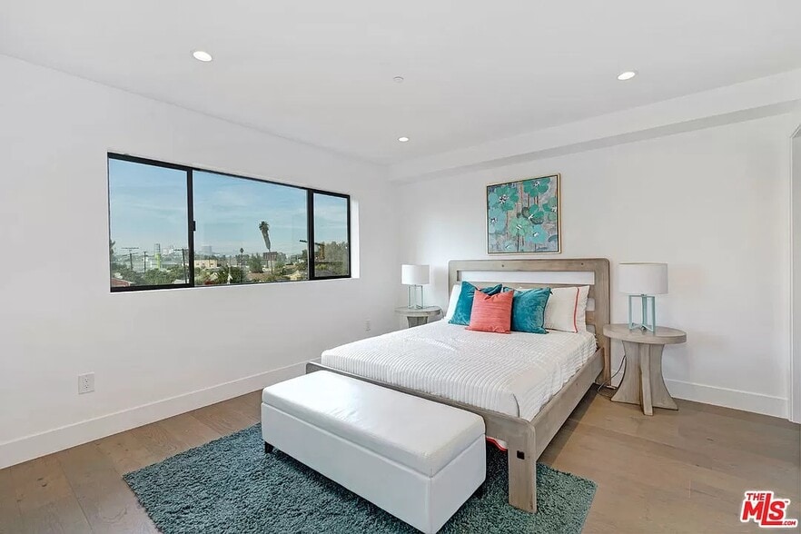 West-facing 3rd fl. bedroom with wall-to-wall closet - 6077 Hargis St