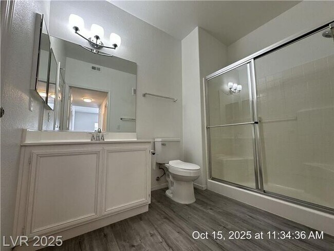 Building Photo - SPACIOUS FIRST-FLOOR CONDO LOCATED IN A GA...