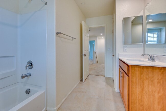 Building Photo - Green Valley!! Gated!! 4 Bedrooms!! Bed & Bath Downstairs!!  TANKLESS WATER HEATER!!! Covered pat...