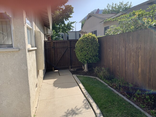 Clear redwood rear yard fencing enclosure - 2935 Westwood Blvd