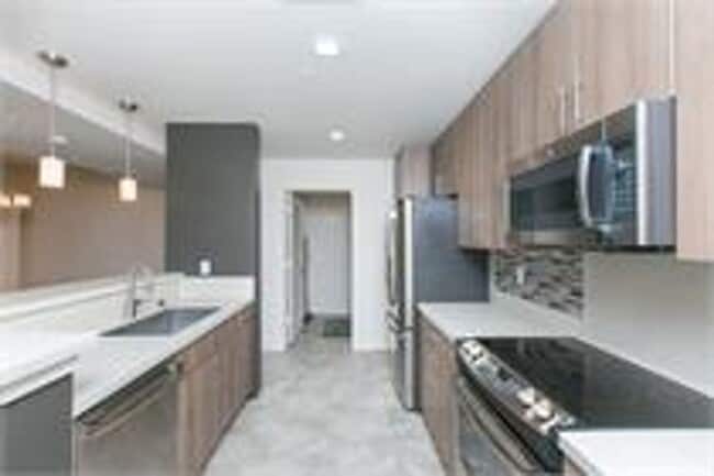 Building Photo - Live in the Heart of Kailua Town in this rarely available end unit!