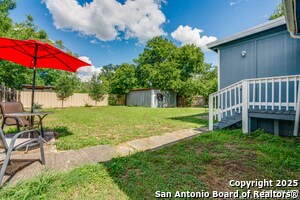 Building Photo - 5027 Blue Bonnet St