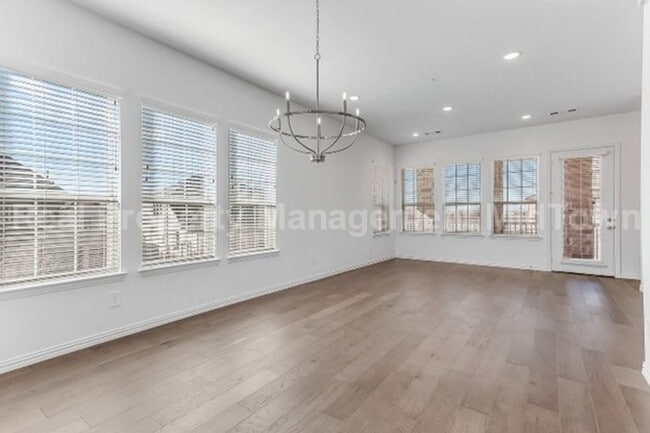 Building Photo - Live Elevated in the Heart of Viridian – S...