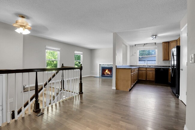 Building Photo - $2,720.95 - 4 bed, 2 bath, located in Aurora with attached Garage and In Unit Washer and Dryer!