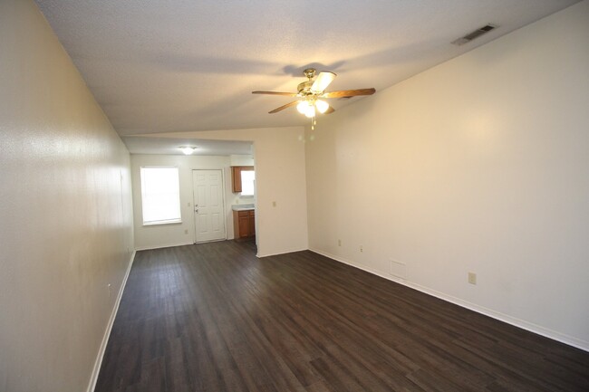 Building Photo - 3/2 brick with fenced backyard in SW Pensa...