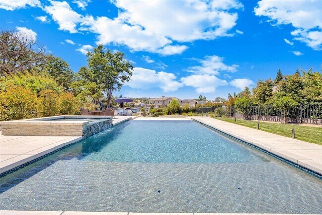 Building Photo - Luxury Lakefront Retreat with Pool, Hot Tub & Private Dock on Lake Tulloch - Recently Remodeled!