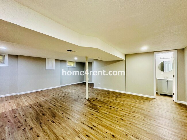 Building Photo - Like New, Ranch Style Home in Raytown - Wood Floors, Finished Basement, Fenced Yard!