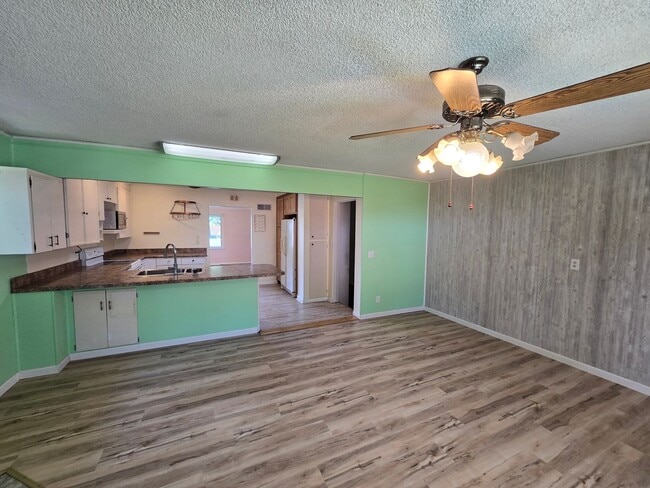 Building Photo - Spacious 4 Bedroom Home with Solar Panels, Fully Fenced Yard on Rimrock Rd