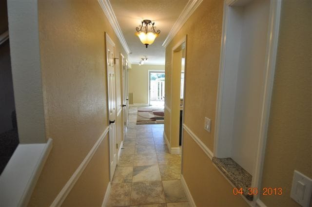Entrance to Townhome. Outstanding fixtures throughout the Townhome. - 13059 Lincoln Way
