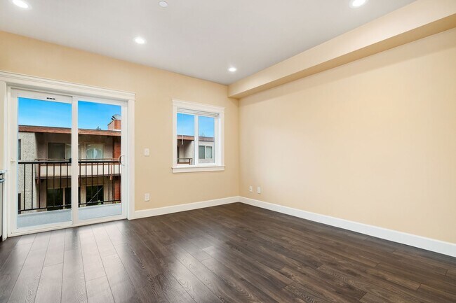 Building Photo - Refined Studio Living at Marigold Apartments — Available Now