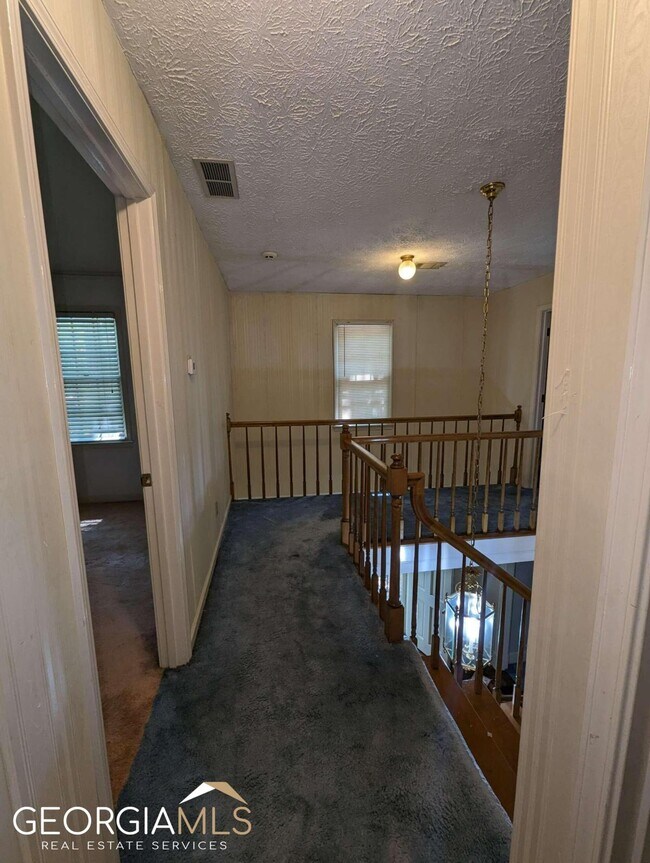 Building Photo - 1651 Howell Highlands Pl