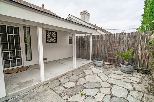 Building Photo - COMING SOON! Charming 2-Bedroom Home with a Versatile Loft in The Bungalows of Valencia!