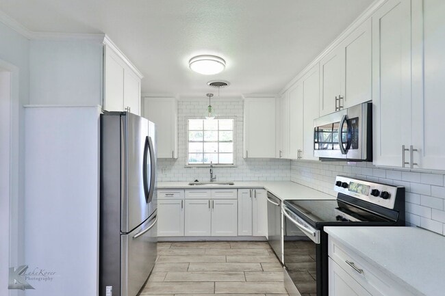 Building Photo - Complete RENOVATION only a few years ago!  Large bedrooms!