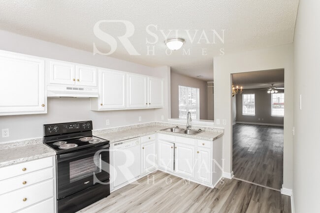 Building Photo - Welcome to this beautiful and sun-filled 3...