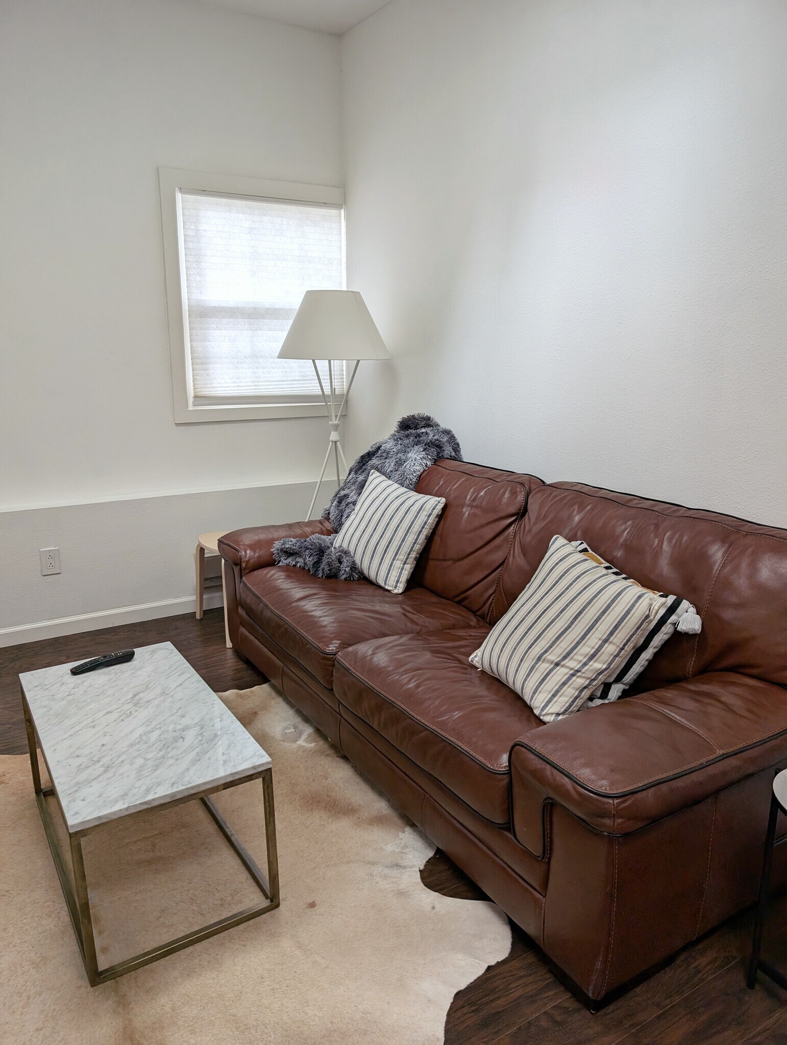 Marble coffee table and leather couch - 26 Saddle Brook Ct