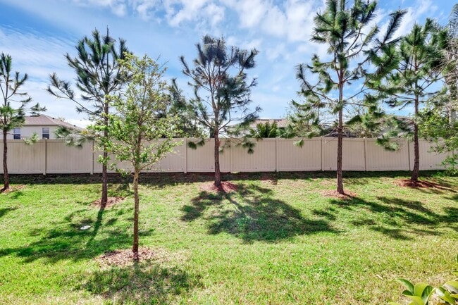 Building Photo - Spacious, Nearly New and Gated 3/2.5/2 Plu...