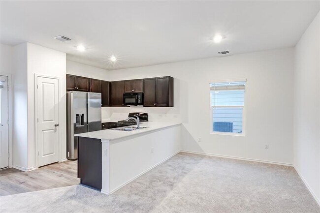 Building Photo - 7706 Poppy Petal Dr