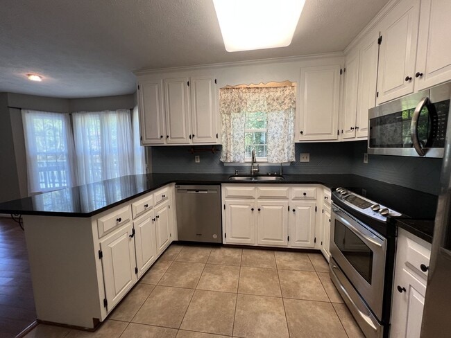 Building Photo - Spacious 5-Bedroom Home on Over Half an Ac...