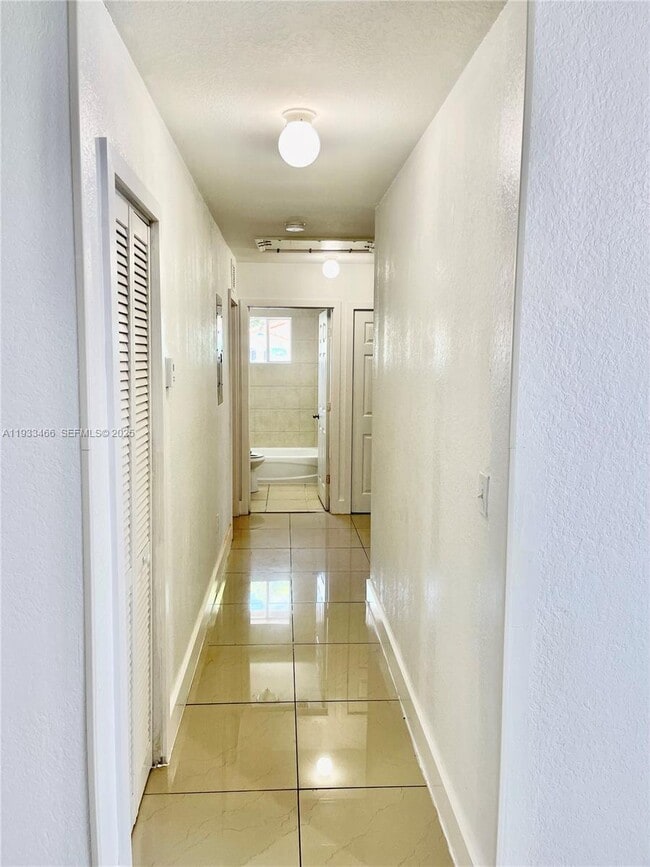 Building Photo - 5857 NW 13th Ave