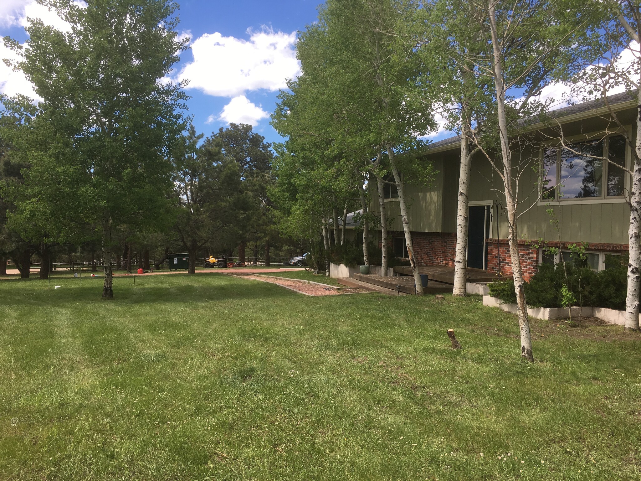 Front, and driveway - 15175 E Coachman Dr