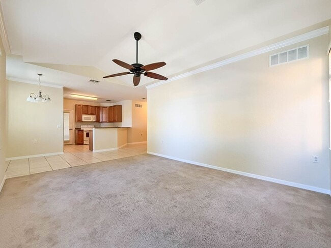 Building Photo - Beautiful 3-Bedroom Condo with 2-Car Garag...