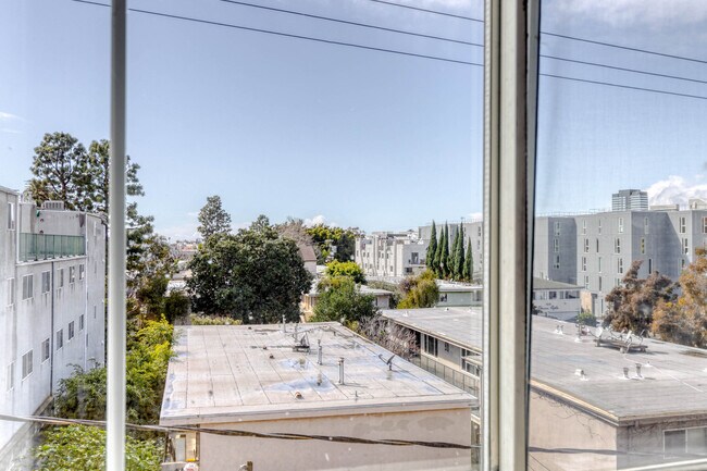 Building Photo - 1561 S Barrington Ave