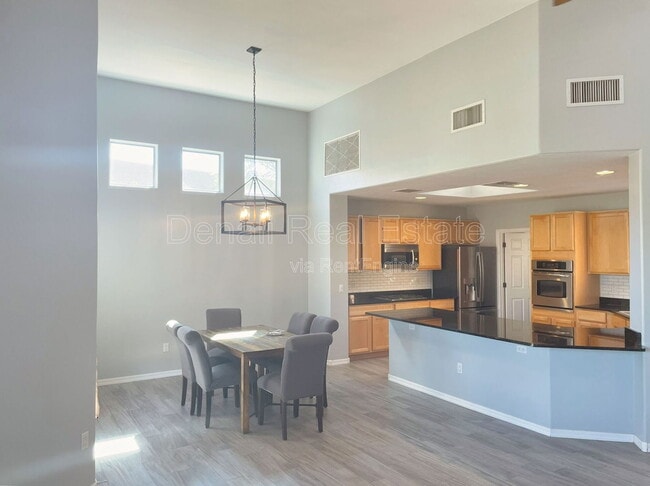 Building Photo - 8069 N Painted Feather Dr