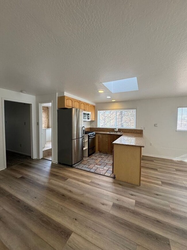 Building Photo - Charming Riverfront Cottage in Verdi – One...