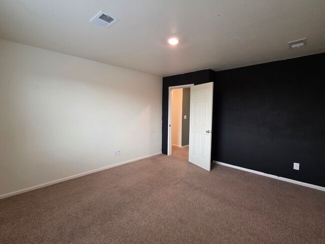 Building Photo - MASSIVE 5 Bedroom Home In Bennett!