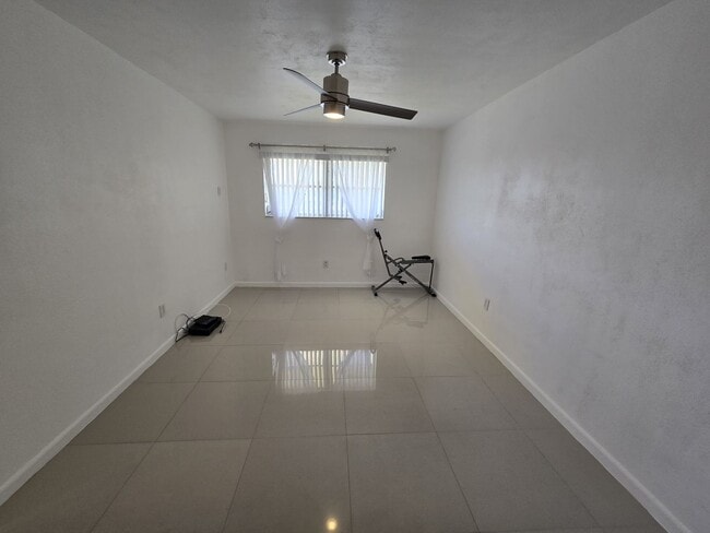 Building Photo - 2-Bed, 2-Bath Miami Condo in HOA Community – Pool, Laundry On-Site