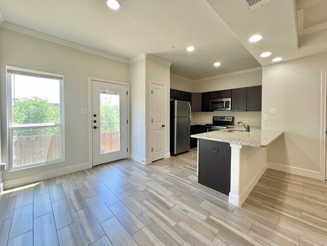 Building Photo - Spacious Townhome with a Private Backyard & No Rear Neighbors!