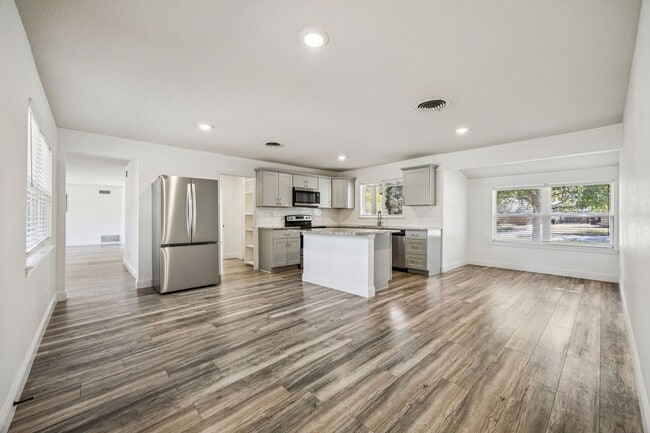 Building Photo - Stylish Renovation + Solar Savings in Prime Location