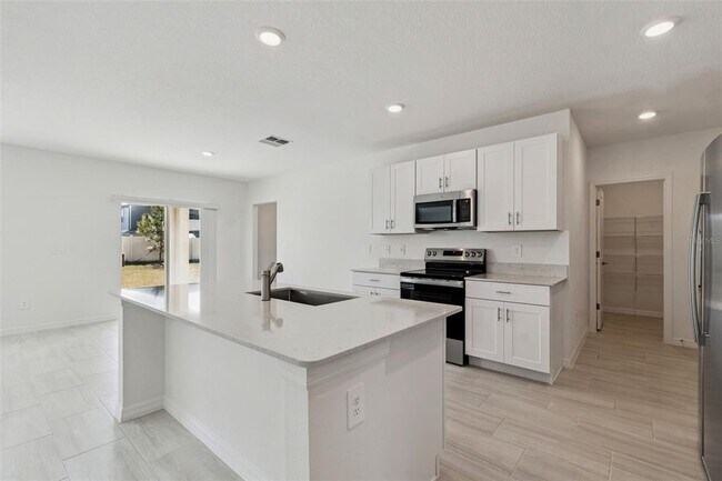 Building Photo - 1712 Tropical Oasis Ave