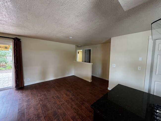 Building Photo - Charming 3 Bedroom Home with Beautiful Backyard & RV Parking