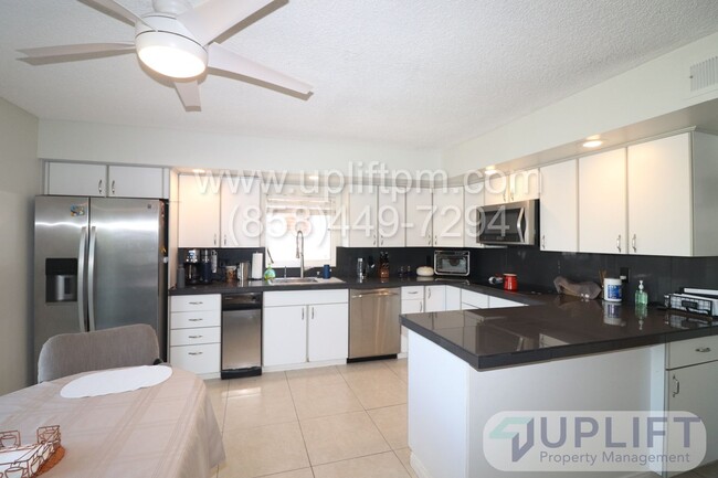 Building Photo - Spacious 4-Bed, 3-Bath Home with Unique Fe...