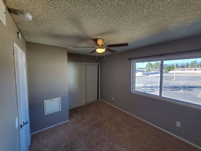 Building Photo - Nice 2-Story 2-Bedroom Condo Available in ...