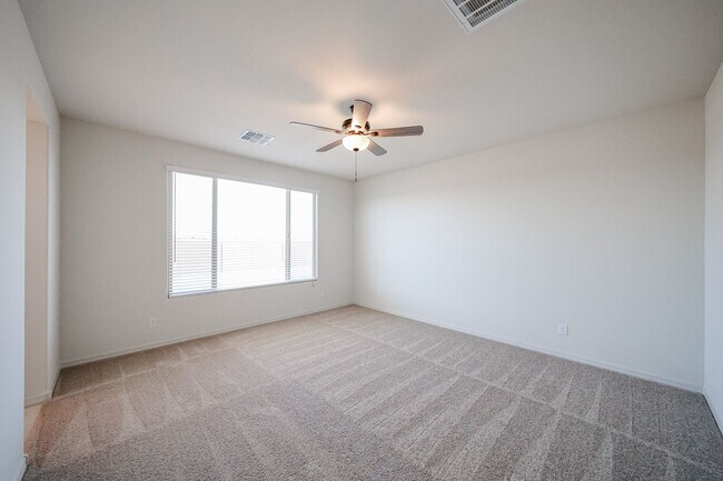 Building Photo - New 4 Bedroom + Den Home in Asante Community
